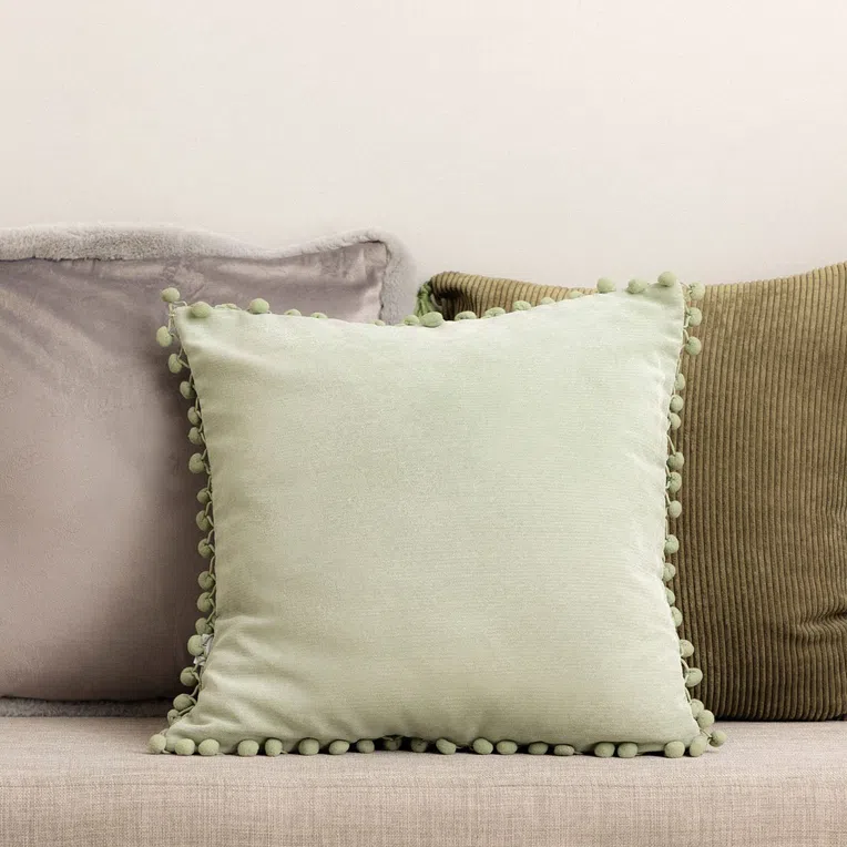 Poszewka ESLOV z pomponami pistacjowa 45x45 cm